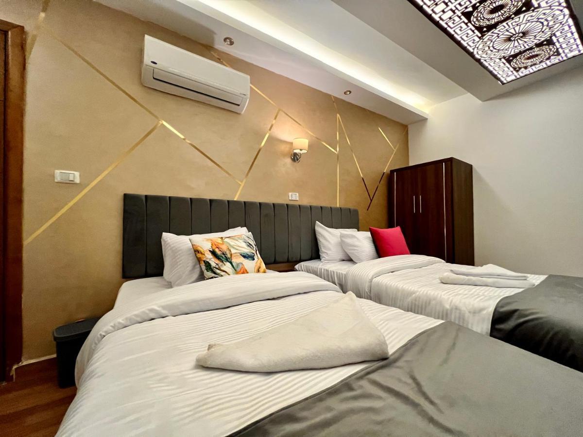 Grand Pyramids Inn Kafret el-Gabal Eksteriør billede