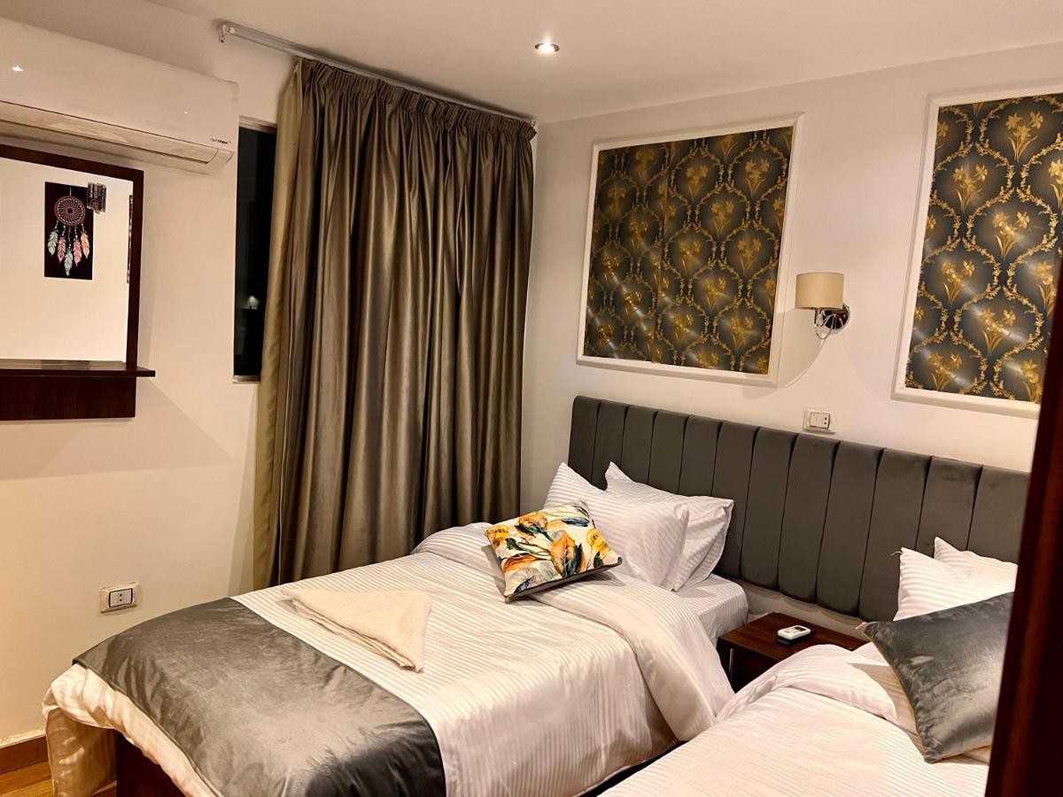 Grand Pyramids Inn Kafret el-Gabal Eksteriør billede