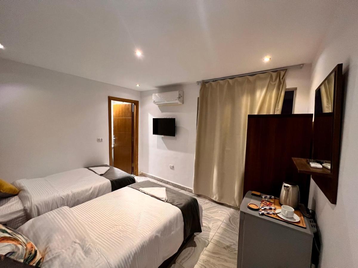 Grand Pyramids Inn Kafret el-Gabal Eksteriør billede